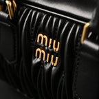 Miu Miu Black Matelassé Leather Top Handle Bag